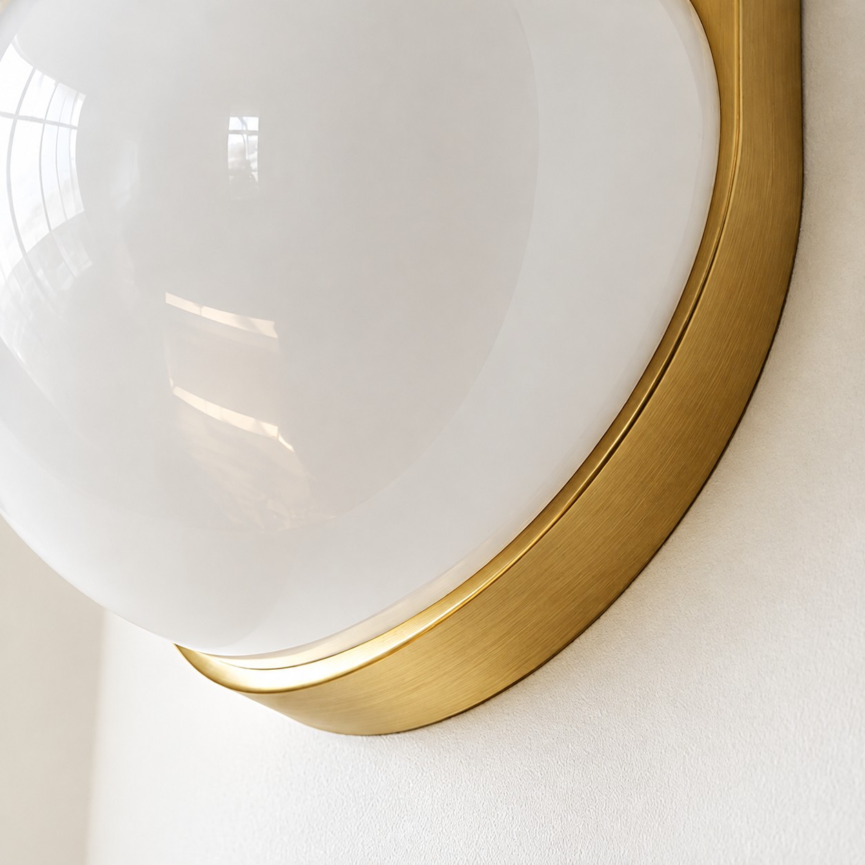 Cream glass globes on a black metal backplate